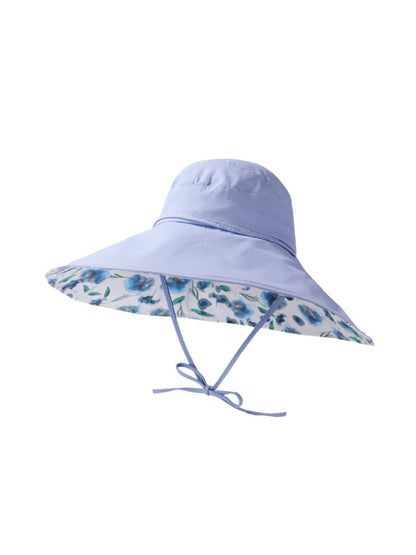 Haila hat folded to show reversible feature with floral and solid sides