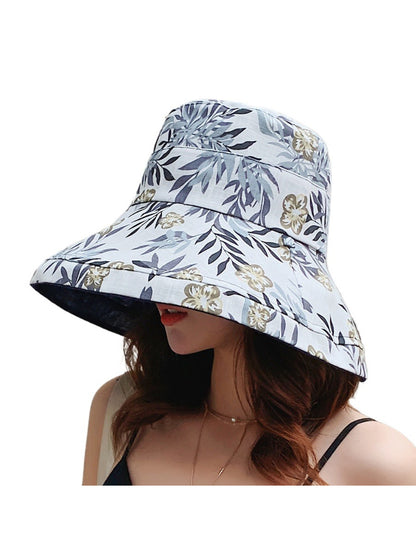 Haila reversible bucket hat placed on flat surface highlighting brim and pattern
