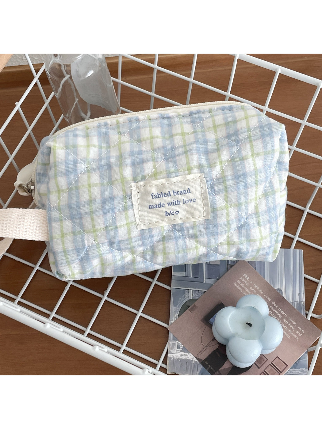 Cosbai pastel check travel makeup bag standing upright with zipper partially open
