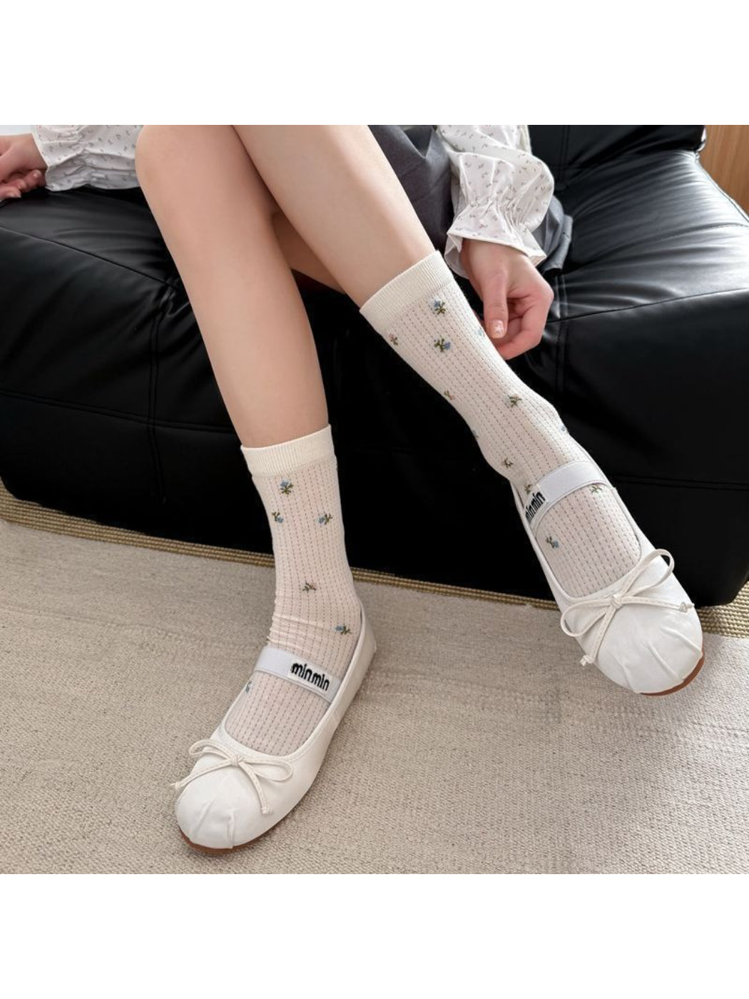 Rufia soft blossom crew socks worn on feet with visible floral design