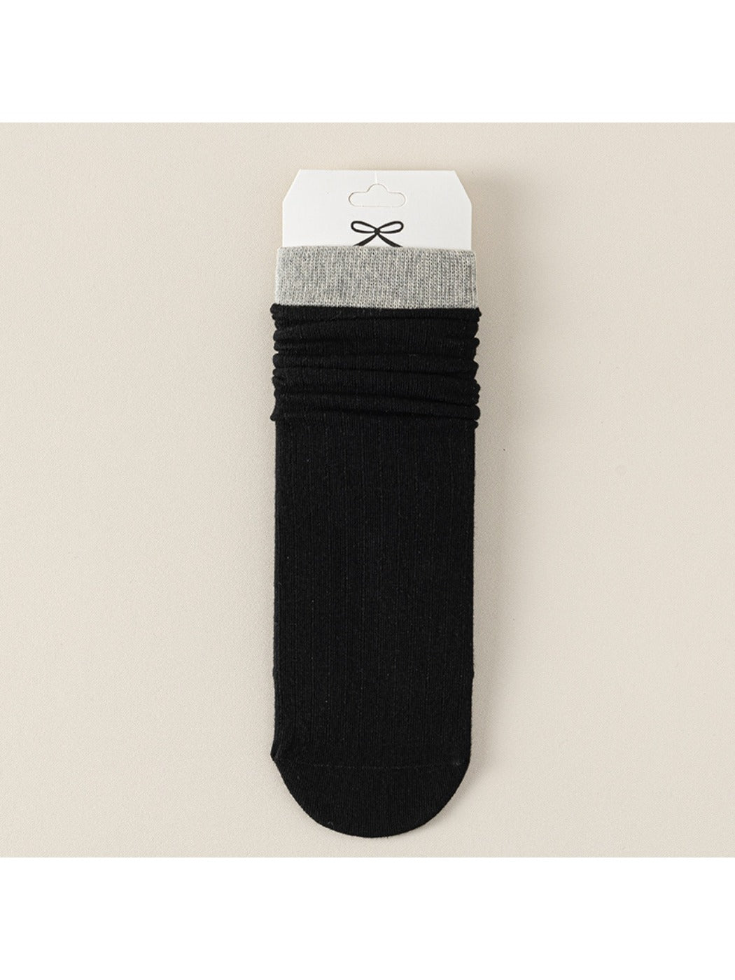Rufia ribbed mid-calf socks for women in black displayed flat on white background