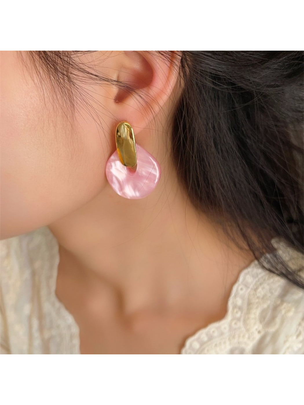 Earwish soft color round drop earrings in pastel blue displayed on white