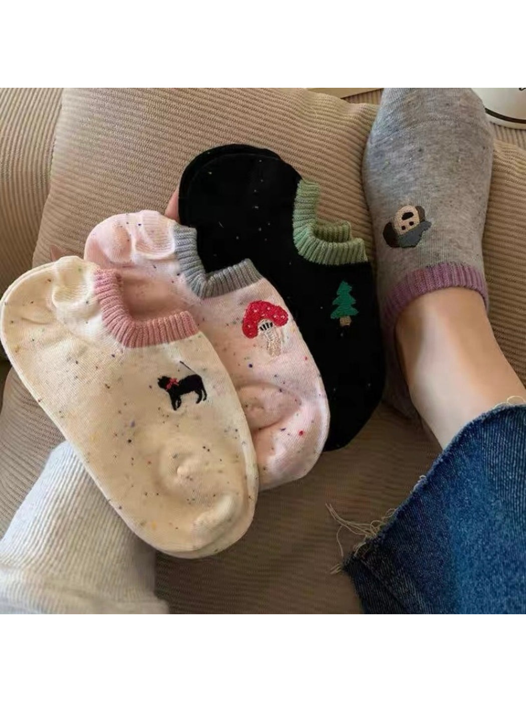 Rufia no show socks displayed flat showing embroidered dot design