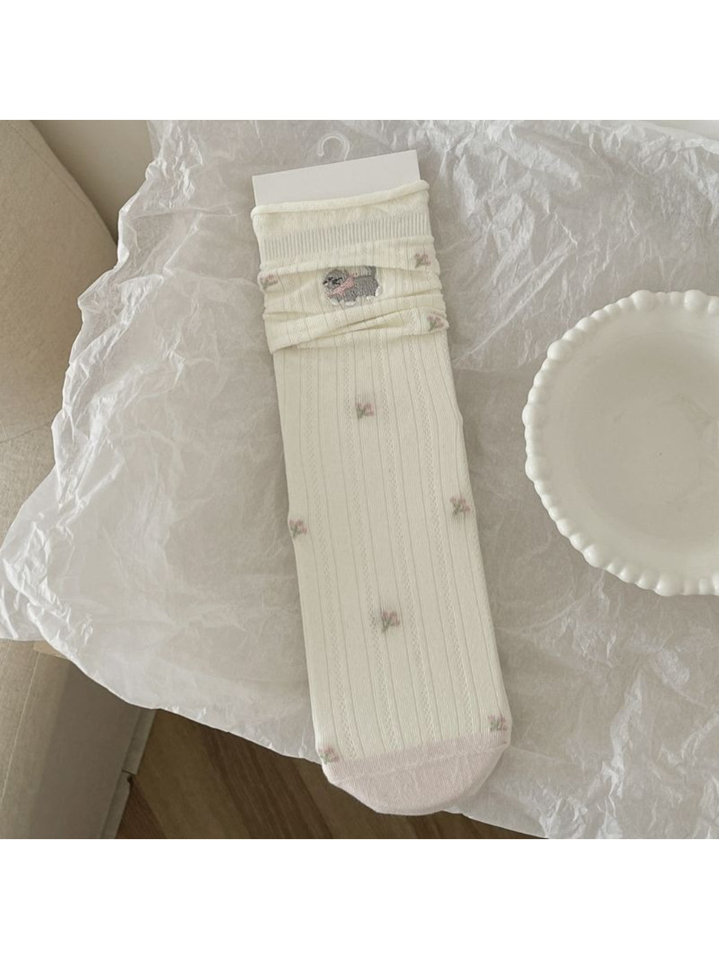Flat lay of Rufia animal detail socks displaying vibrant colors and soft fabric texture