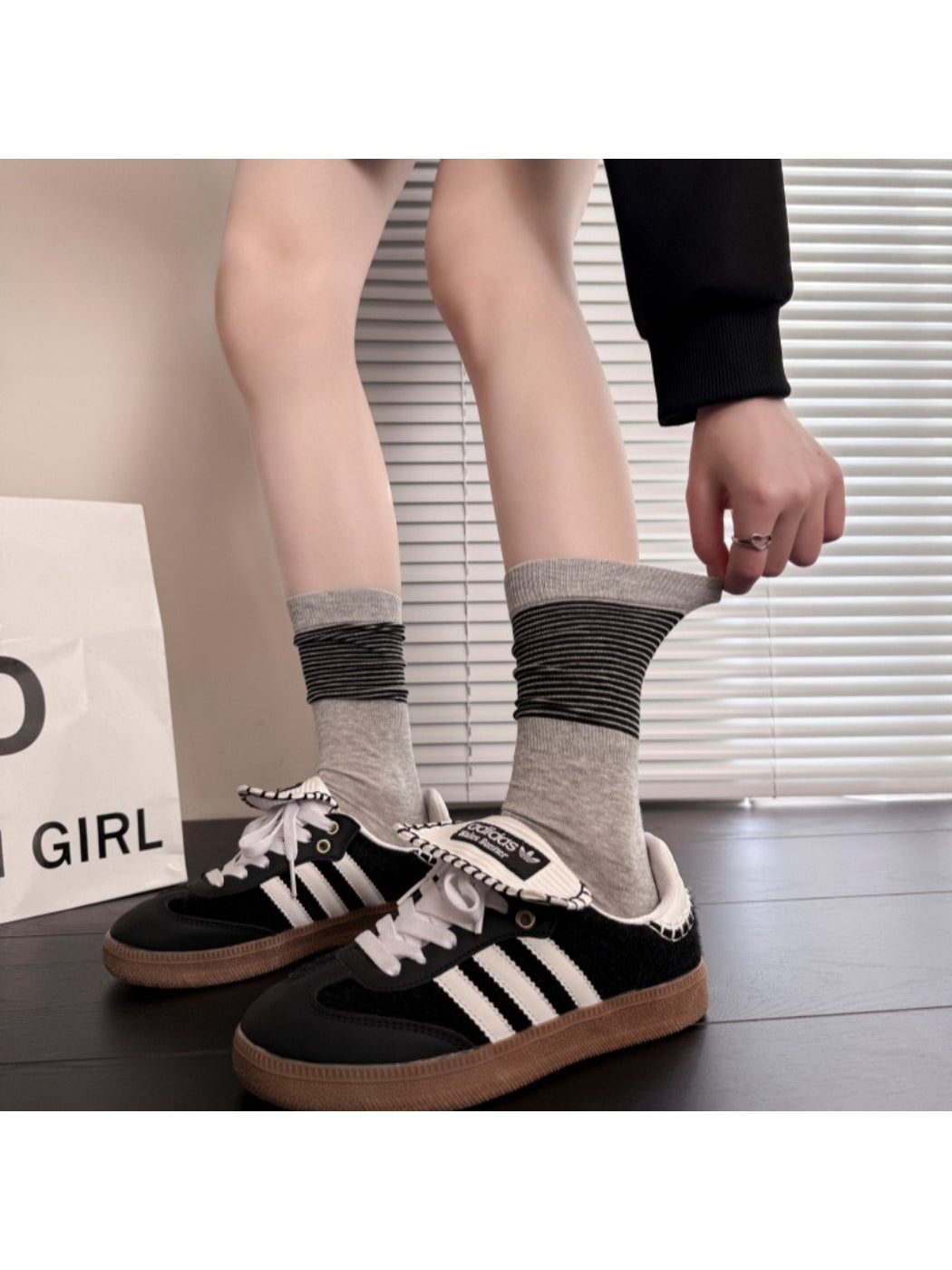 Rufia ribbed stripe mid-calf socks worn on feet showing fit and stripe design