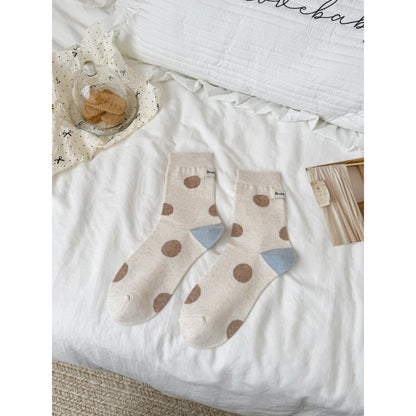 Rufia contrast heel dot pattern socks arranged to show front and side views