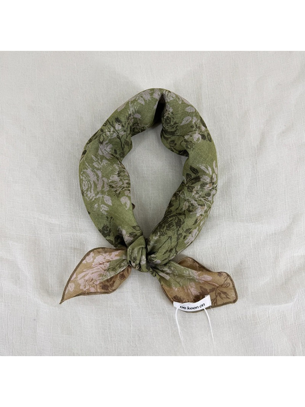 Scarvii vintage floral border square scarf folded showing cream and pastel floral pattern