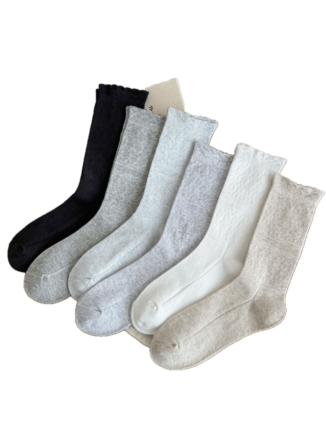 Rufia soft scallop knit socks in beige color displayed flat