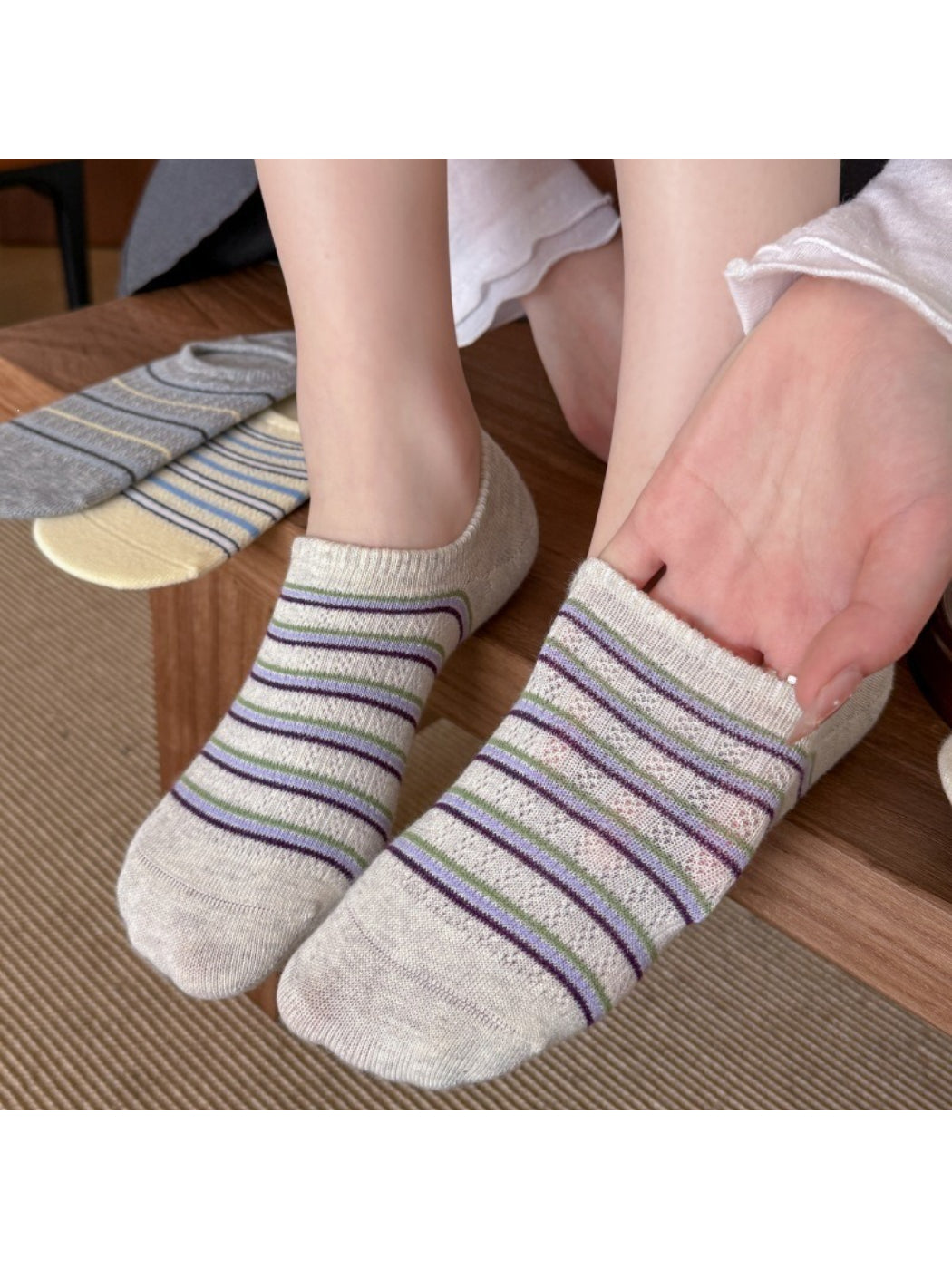 Close-up of Rufia low cut striped socks showing fabric texture and pattern