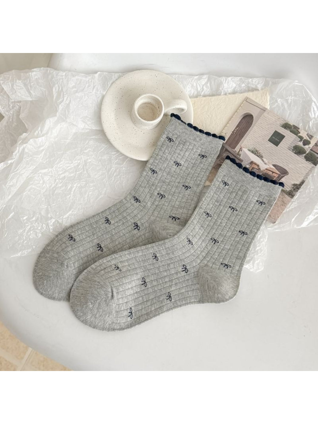 Rufia mixed motif socks displayed with lace trim detail visible