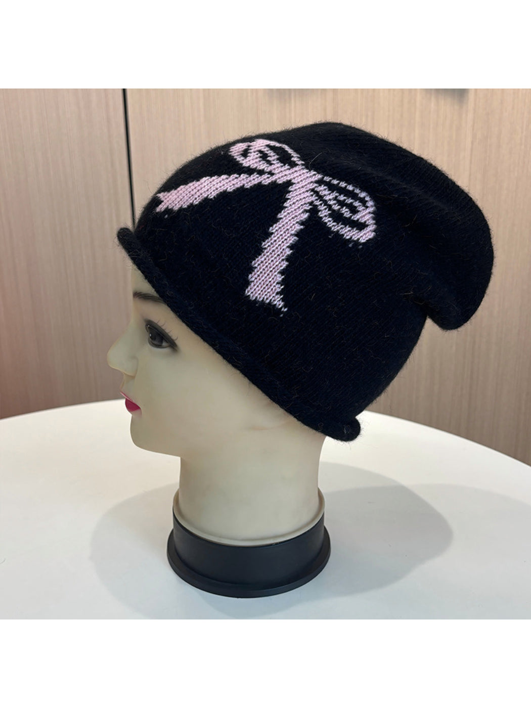 Haila - Bow and Cross Motif Rolled Edge Knit Beanie