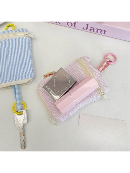 Cosbai Mini Zipper Key Pouch held in hand showing compact size