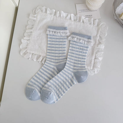 Rufia blue tone crew socks folded neatly on a white background