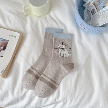 Model wearing Rufia novelty cat knit crew socks with casual shoes