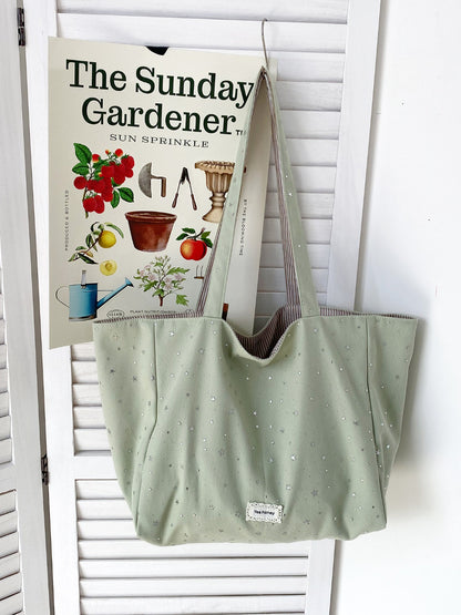 Cosbai Star Print Tote bag placed on wooden surface with lighting