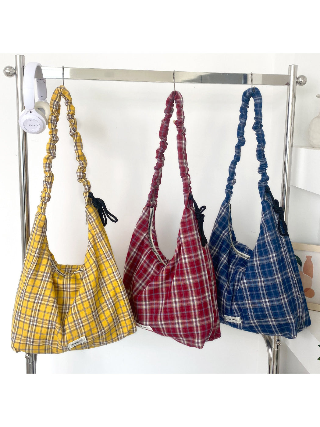 Cosbai plaid slouchy shoulder bag in beige and brown tones, front view