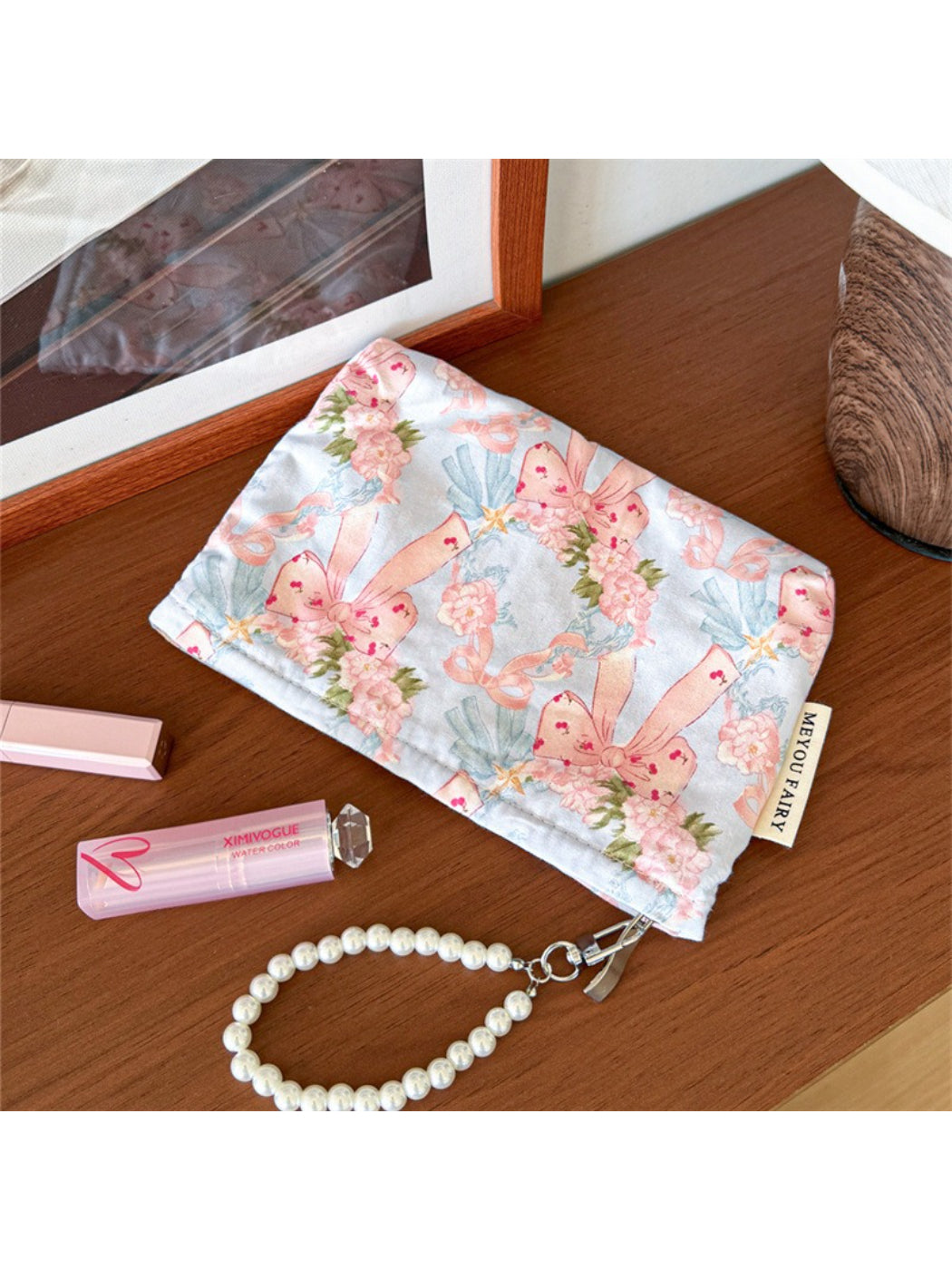 Cosbai Bow Floral Cosmetic Bag angled to show front and side floral design