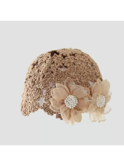Haila romantic flower detail hat styled with casual outfit on model