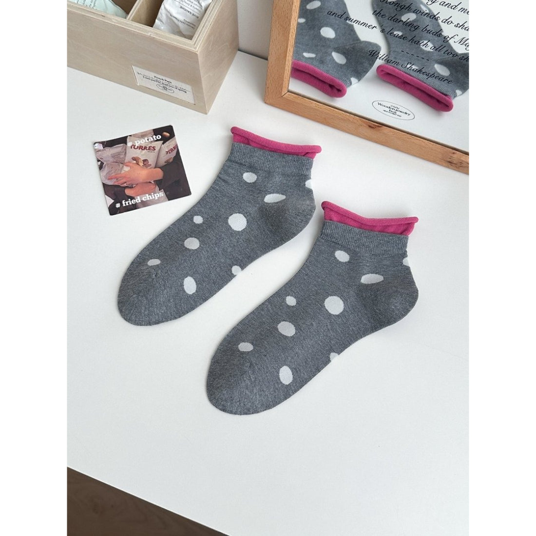 Side view of Rufia Soft Spot Pattern Crew Socks highlighting the crew length and pattern