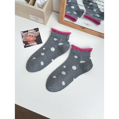 Side view of Rufia Soft Spot Pattern Crew Socks highlighting the crew length and pattern