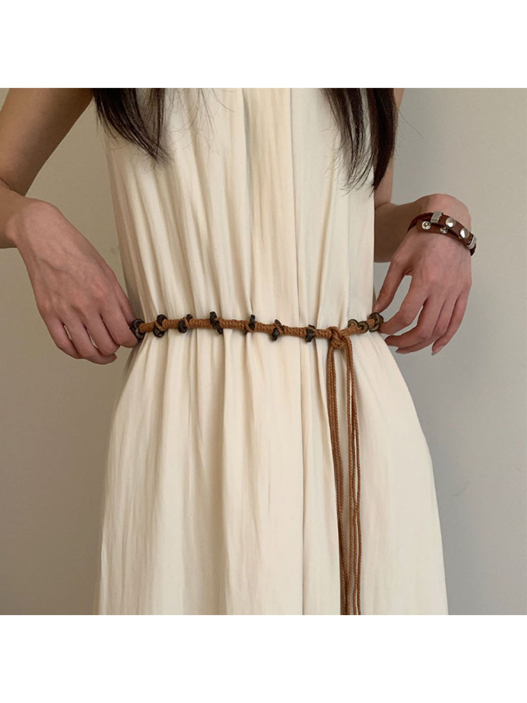 Close-up of Beco knotted rope belt showing detailed twisted rope texture