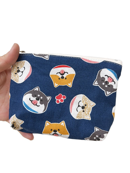 Cosbai small coin purse showing a cheerful cartoon character print