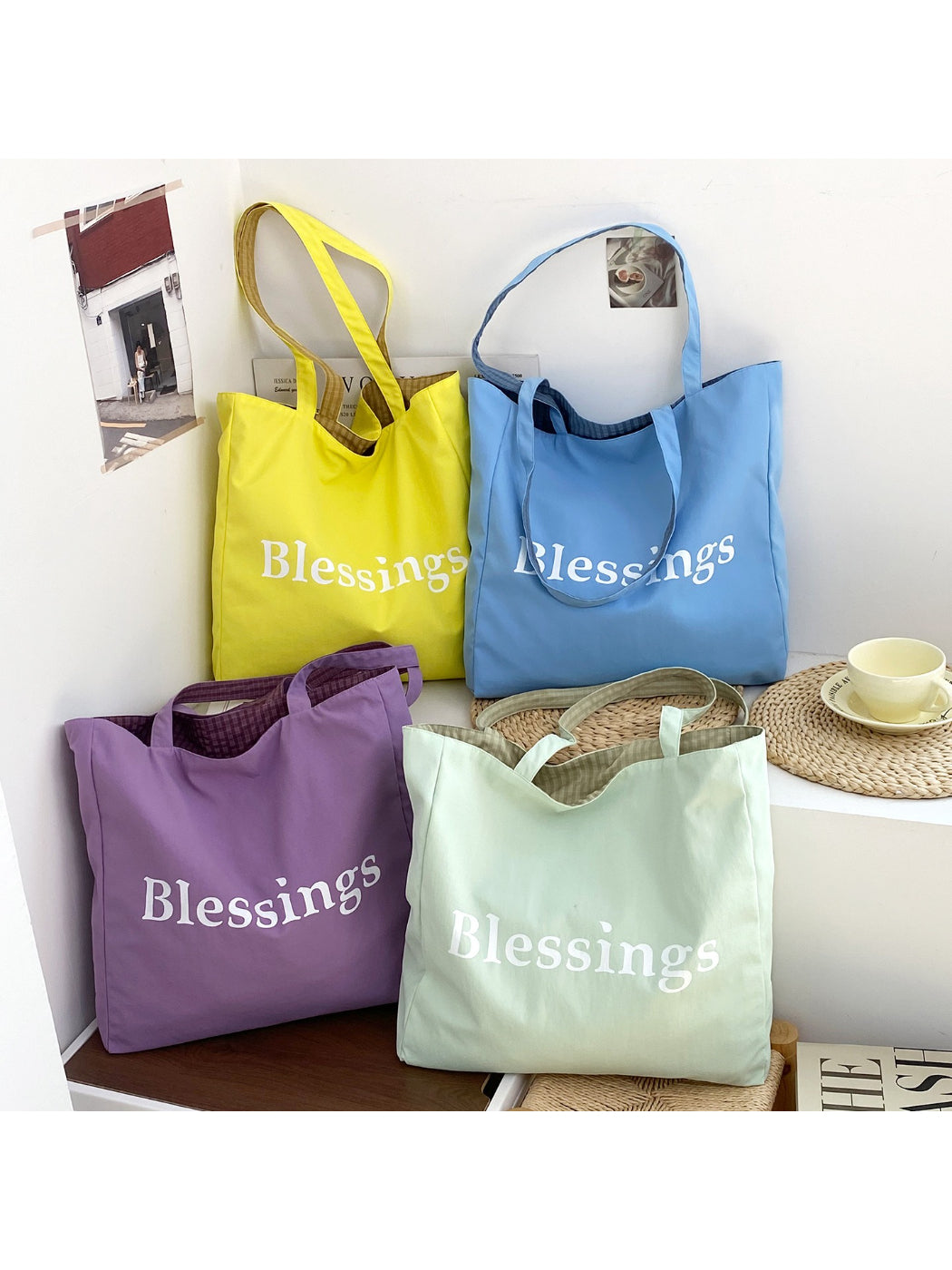 Side view of Cosbai reversible blessings graphic tote bag showing black fabric