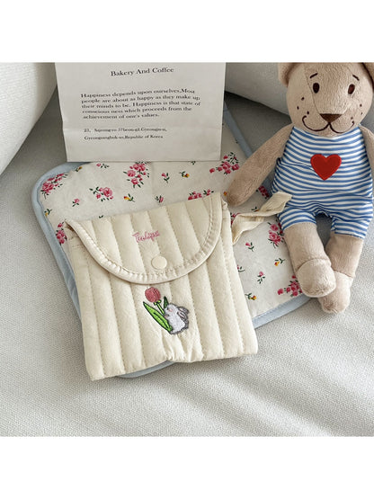 Cosbai animal stitch pouch held in hand to show size and portability