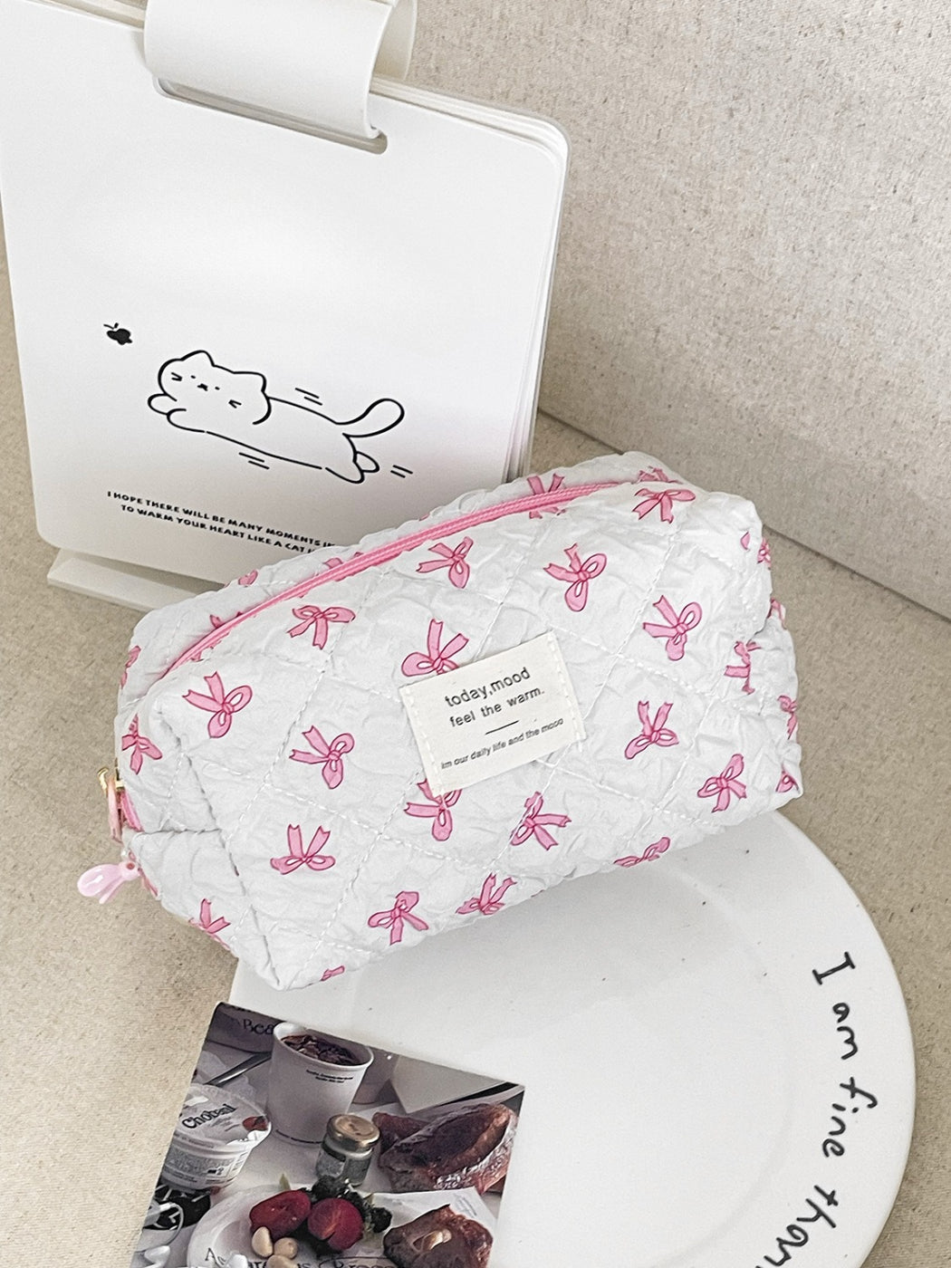 Side view of Cosbai Ribbon Print Zip Organizer highlighting slim profile and zipper