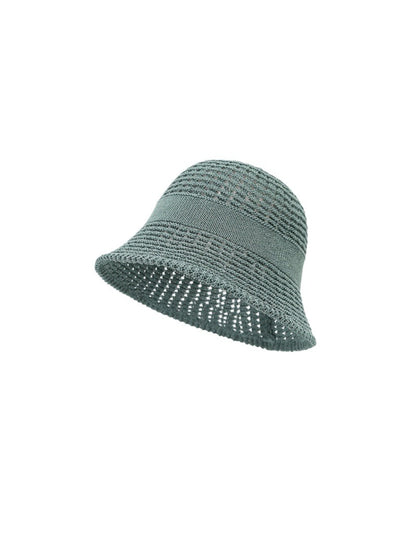 Haila minimal woven bucket hat with band detail angled to show shape