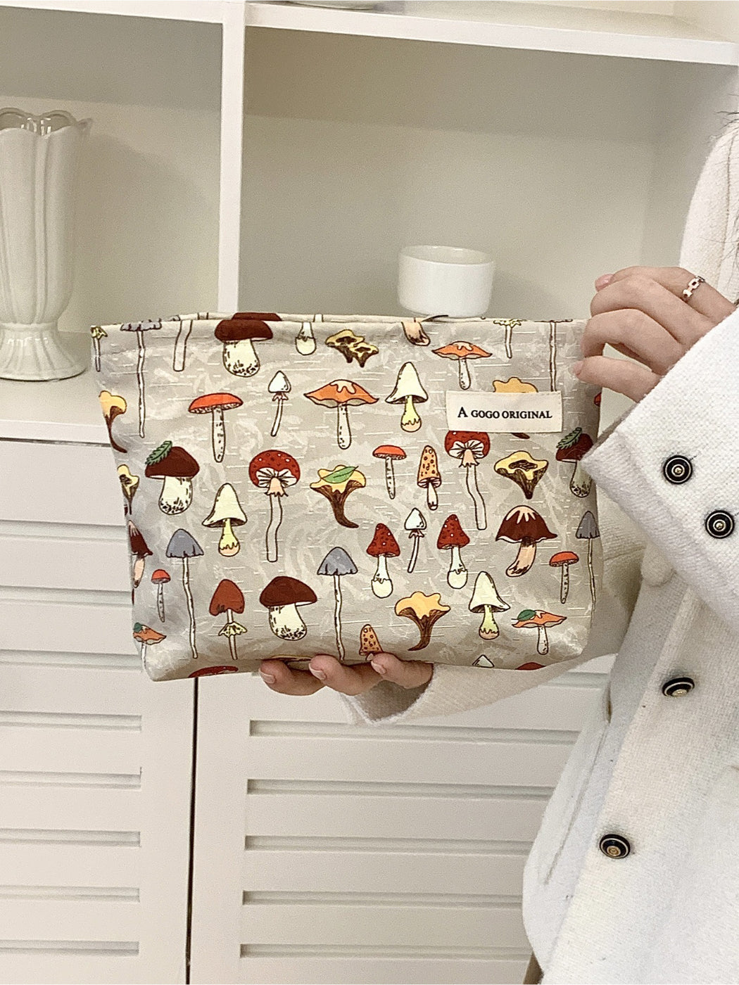 Cosbai cosmetic bag showing and mushroom design on fabric