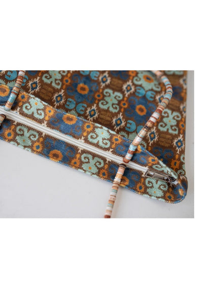 Cosbai Boho Ethnic Tassel Tote bag with vibrant ethnic print and tassels shown from side angle