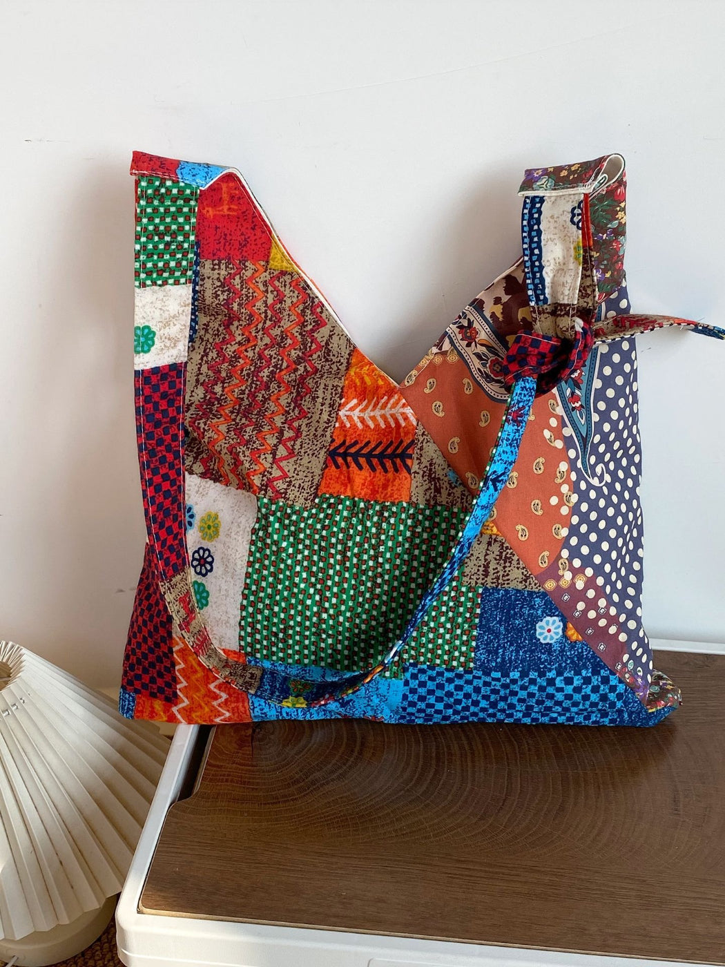 Back view of Cosbai boho print patchwork shoulder bag with fabric texture