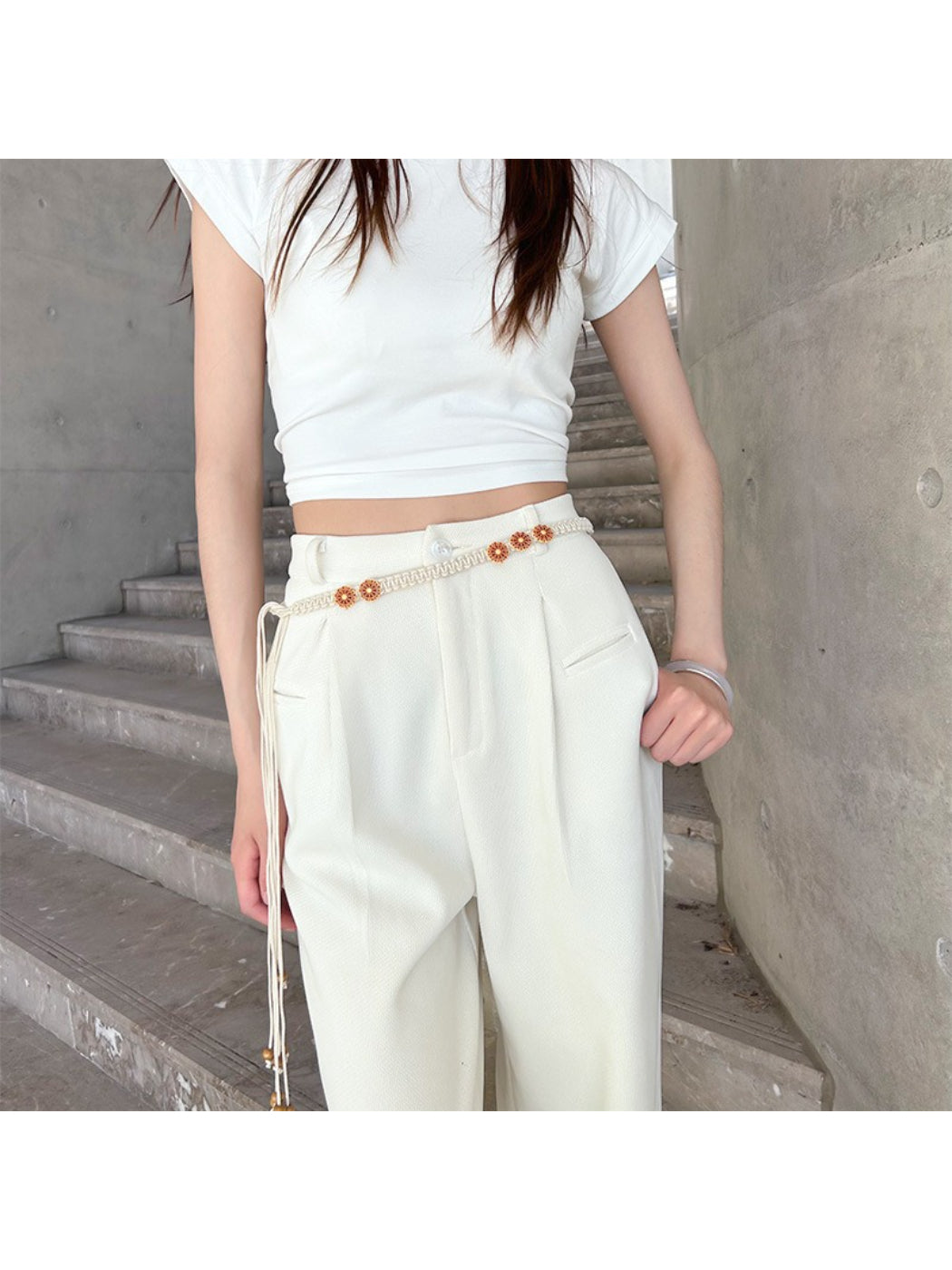 Beco floral rope tie waist belt coiled to display texture and colors