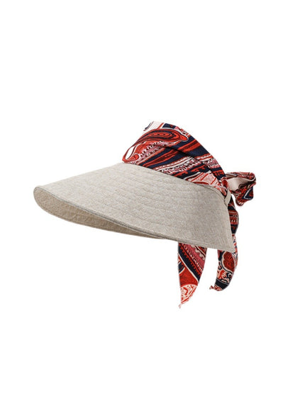 Close-up of Haila hat's open top design and vibrant boho print
