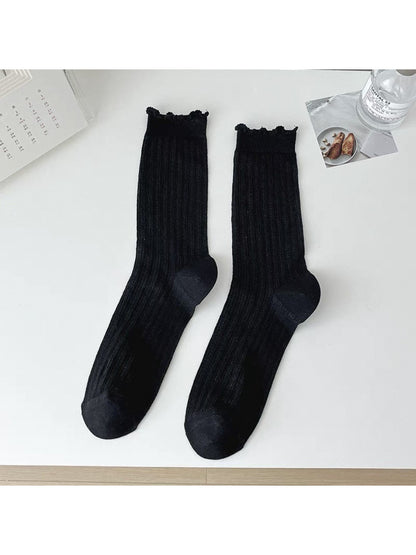 Rufia soft ribbed crew socks with delicate ruffle trim on ankle