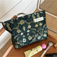 Cosbai dark floral cosmetic bag with a black background and colorful floral pattern