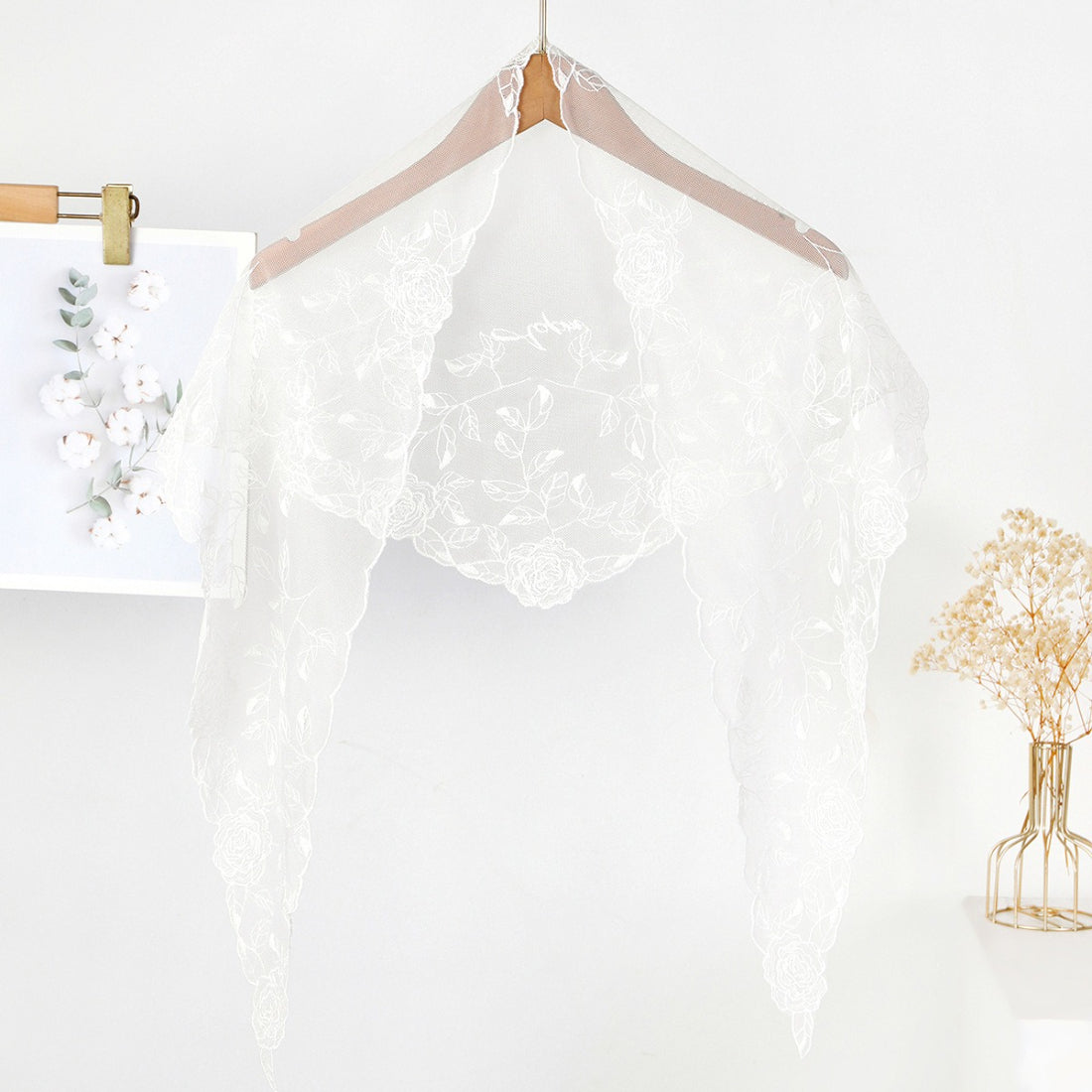 Haila head scarf folded neatly highlighting mesh texture and rose print