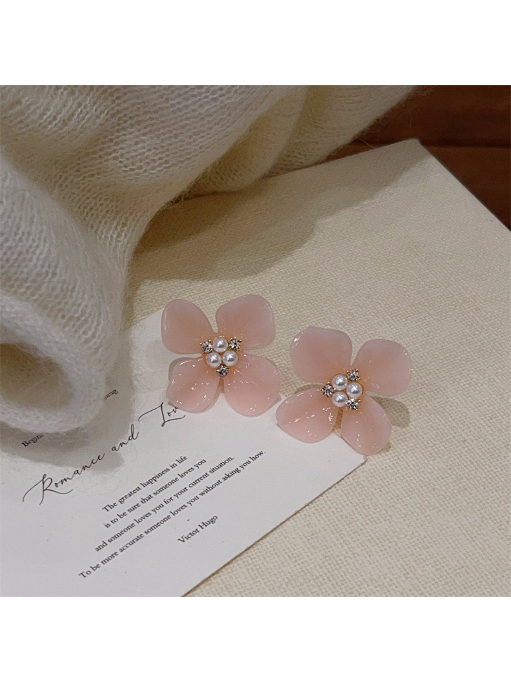 Side view of Earwish Rounded Petal Bloom Earrings showing thickness and rounded edges