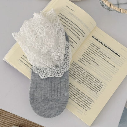 Rufia lace trim crew socks paired with ankle boots in lifestyle setting