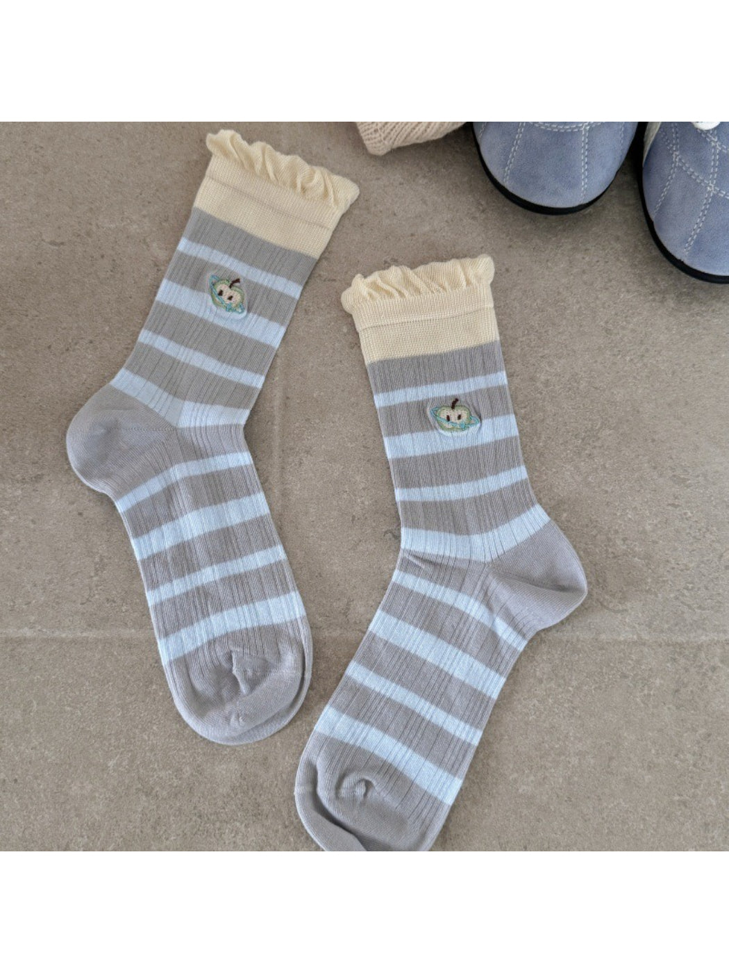 Rufia mid-calf socks arranged to show embroidered lace and mesh fabric details