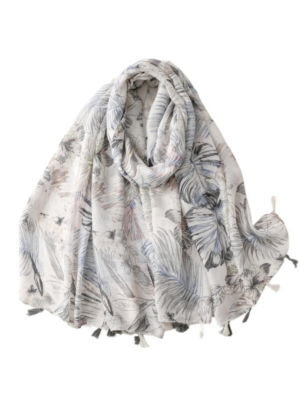 Scarvii scarf draped over shoulder highlighting lightweight fabric and tassel details