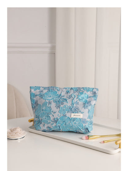 Cosbai floral cosmetic bag with a compact rectangular shape and floral pattern