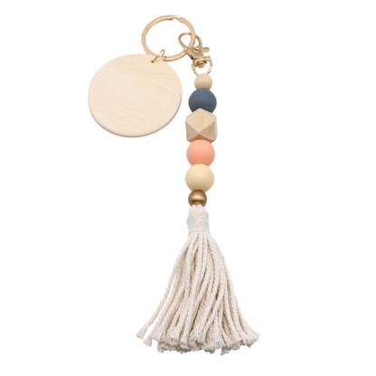 Koco Round Wood Bead Tassel Keychain showing tassel detail