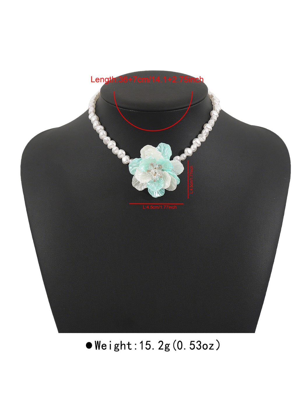 White beaded flower necklace draped over a wooden surface showcasing craftsmanship