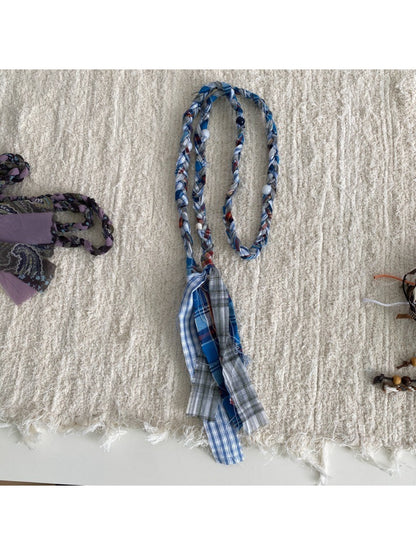 Beco casual braided waist belt arranged in a loop with buckle detail