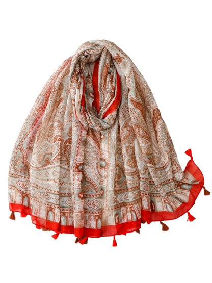 Boho paisley scarf with fringe detail laid flat on white background