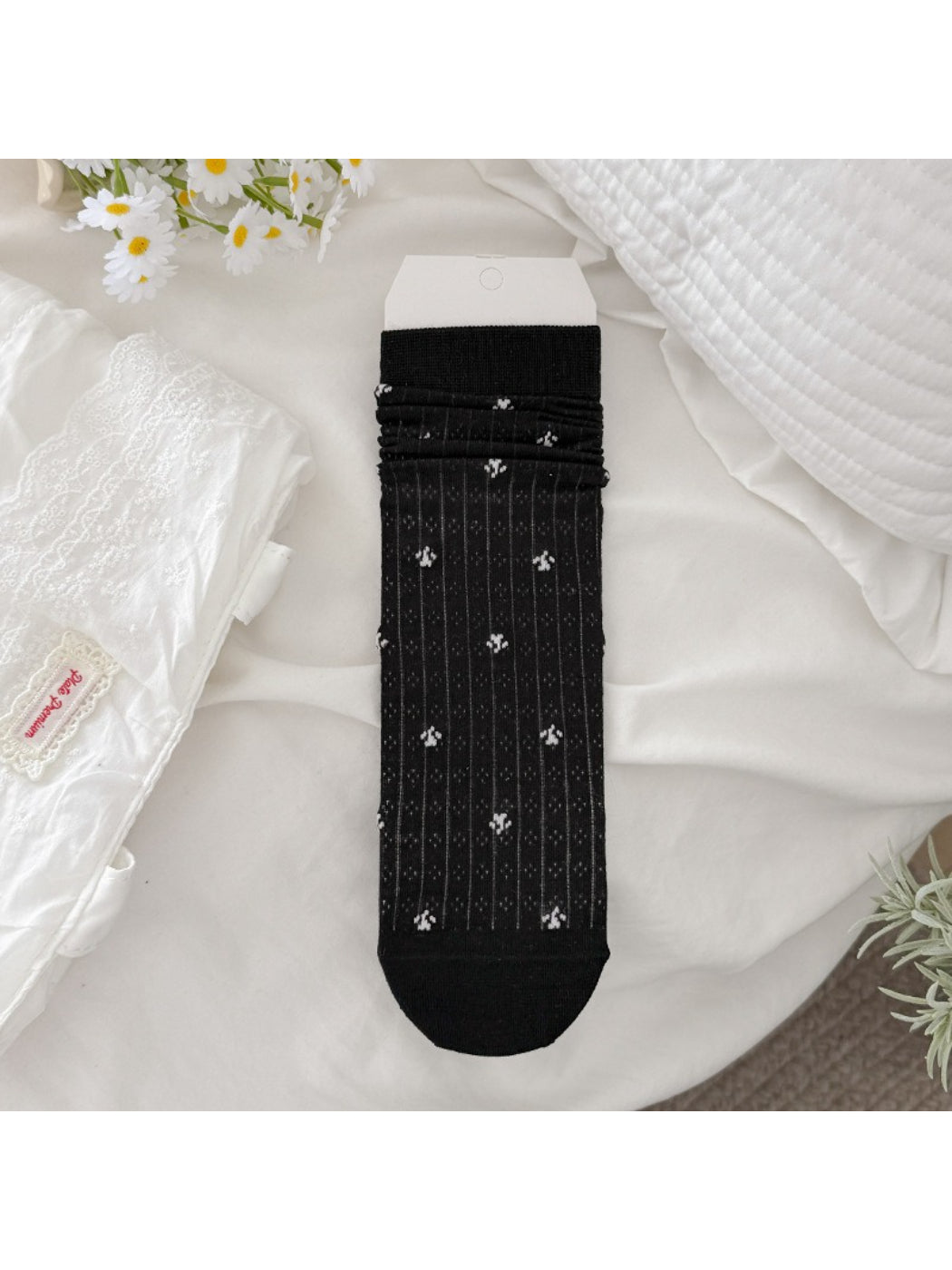 Close-up of toe and heel area on Rufia Ditsy Floral Ribbed Crew Socks