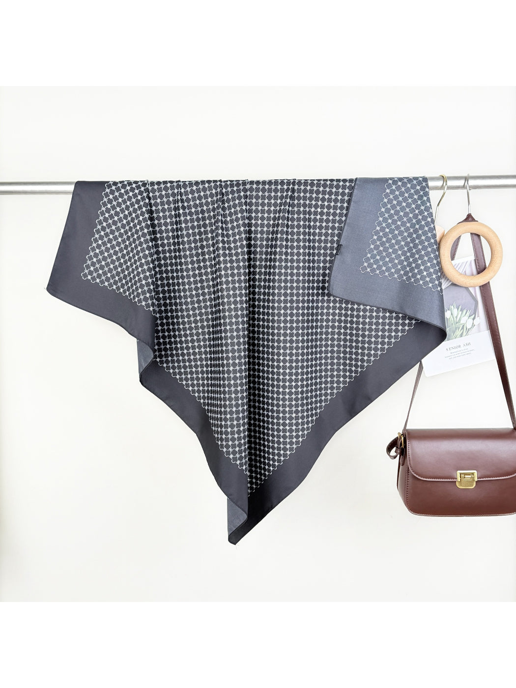 Scarvii Soft Geo Bandana Square Scarf styled as a neck accessory on a model