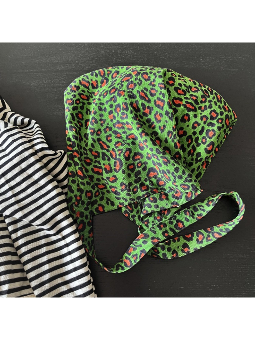 Cosbai Neon Leopard Slouch Tote Bag styled with casual outfit on model